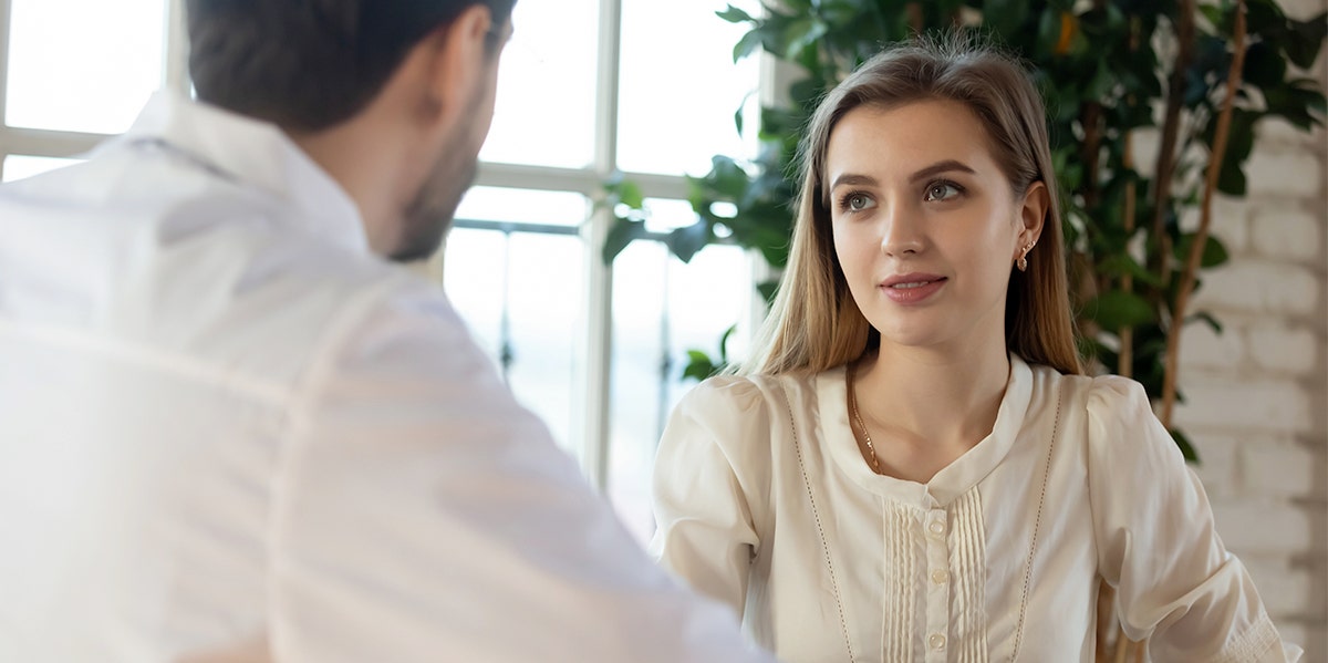How To Read People Like A Pro — With These 7 Simple Tricks woman listening to man