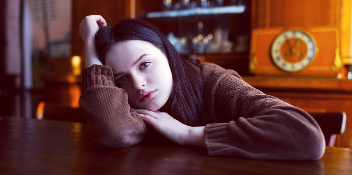 exhausted woman in sweater