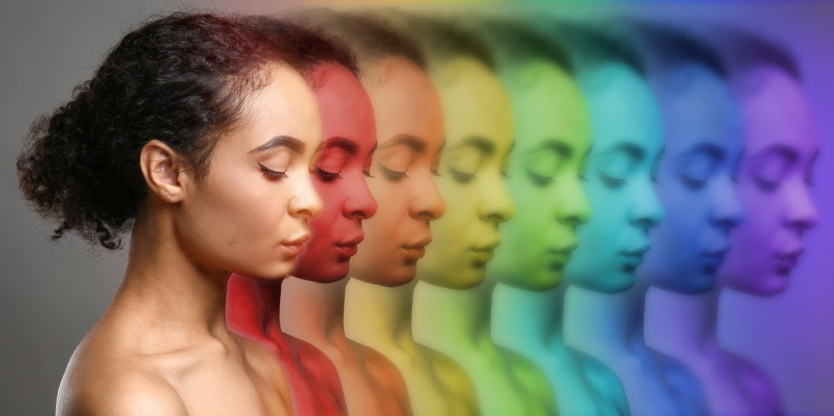 woman with seven different color auras