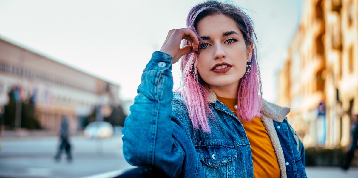 woman with pink hair posing