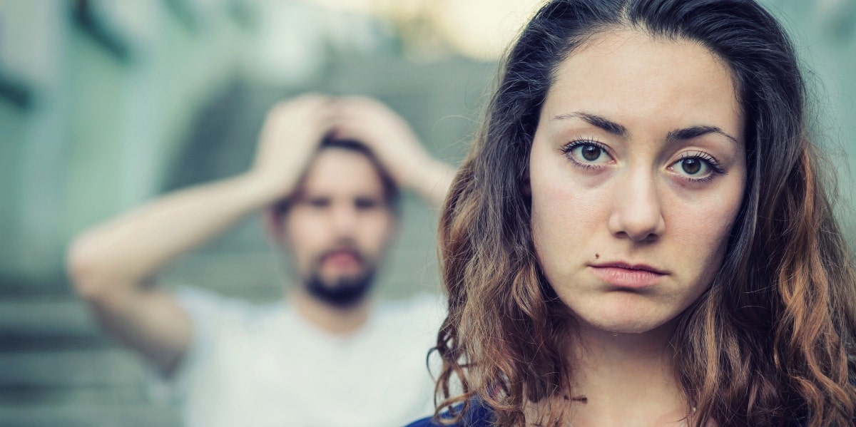 sad woman with upset man