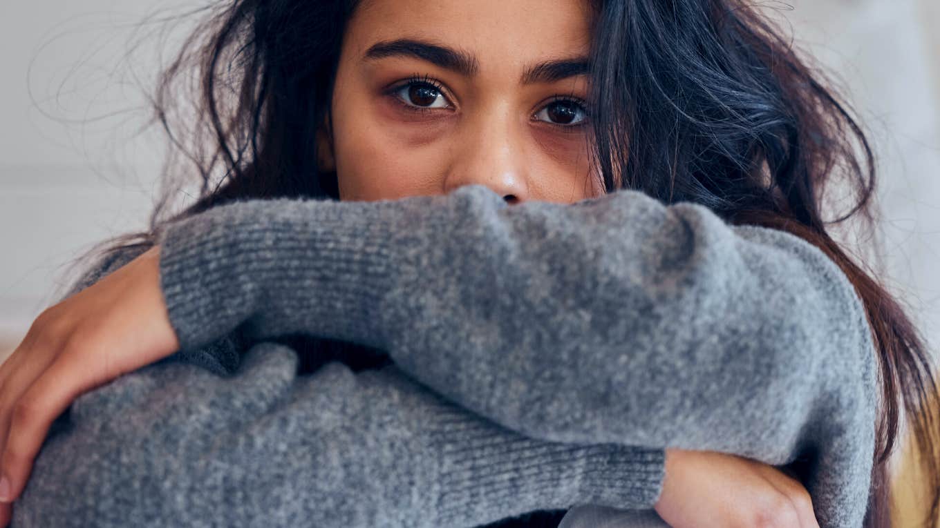 woman with anxiety looking at the camera