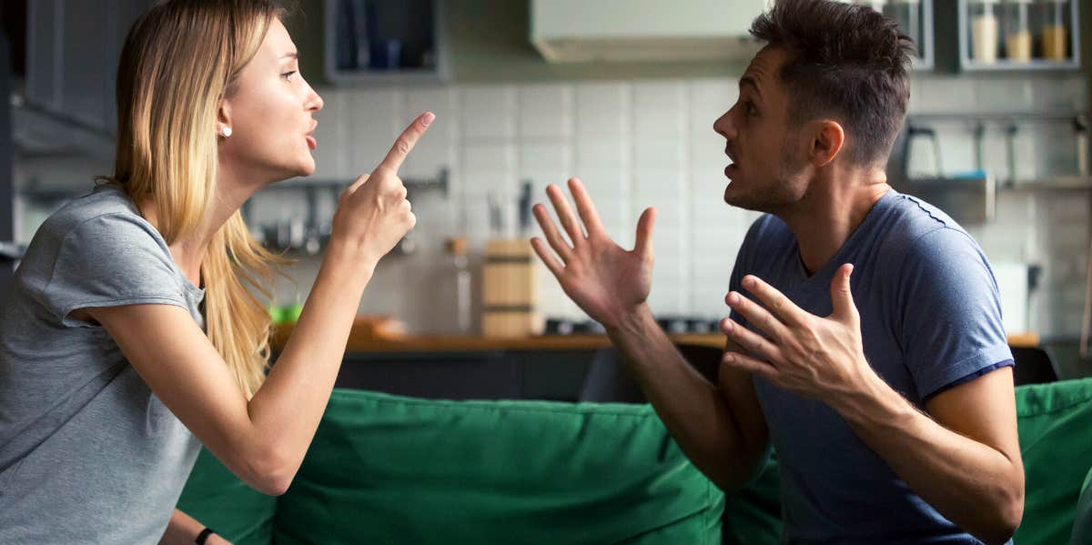 man and woman arguing and pointing fingers