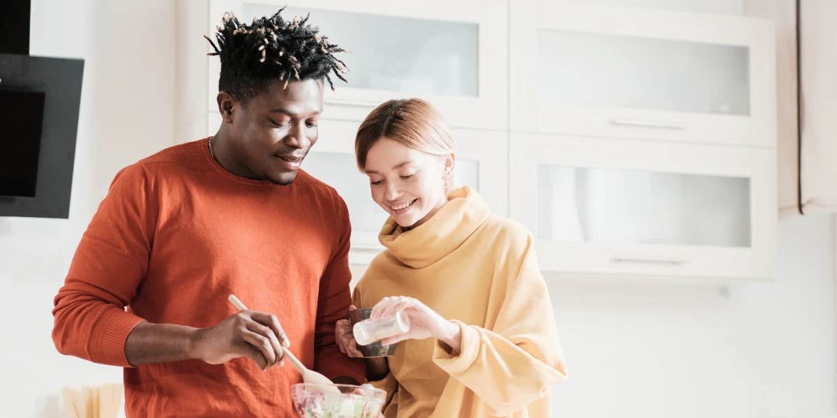 couple breaking eggshells together