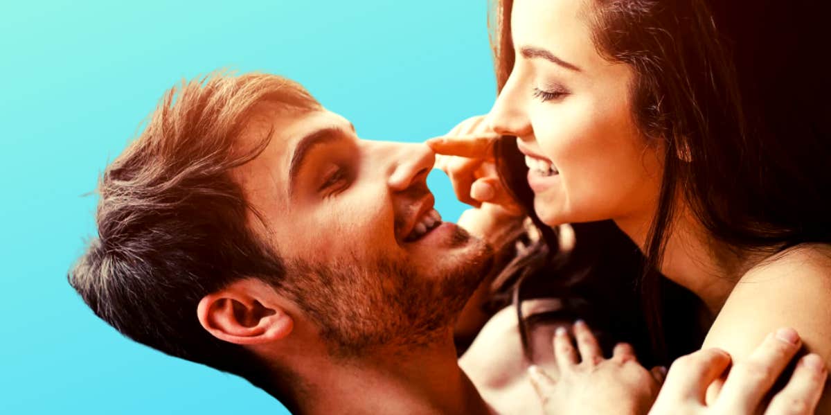 How To Talk About Sex With Your Partner For A Better Marriage couple smiling at each other in front of a bright blue background