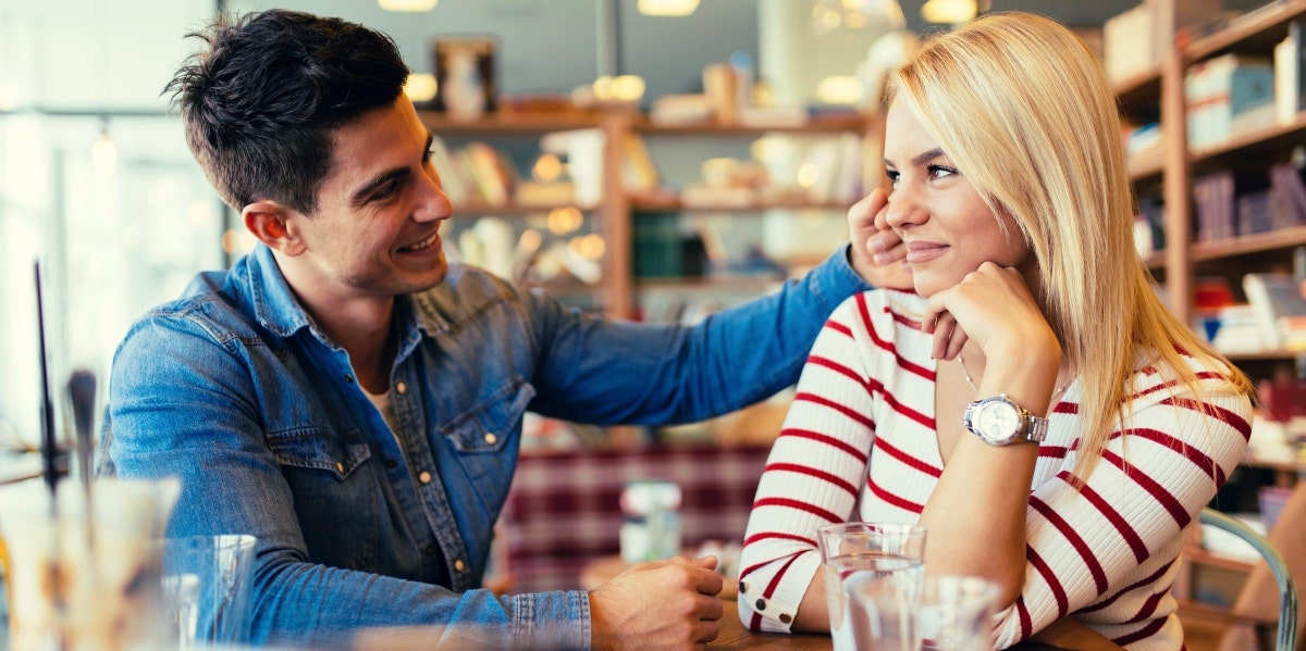 man and woman talking