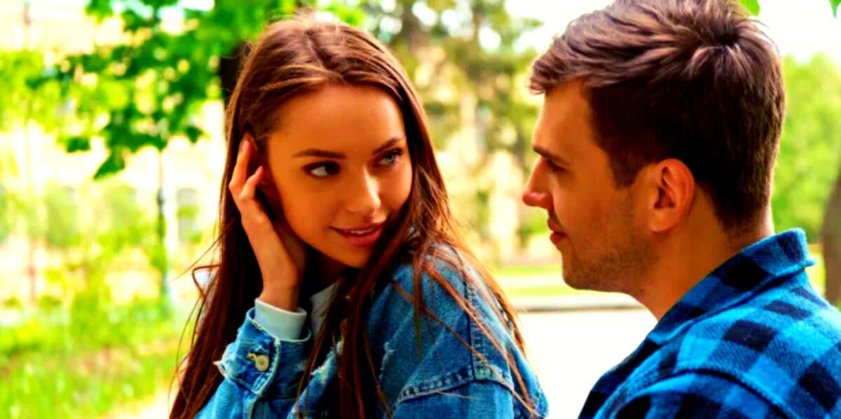 Signs She Wants You To Make A Move (And Signs She Doesn’t) women flirting with man trying to show she wants him to make the first move