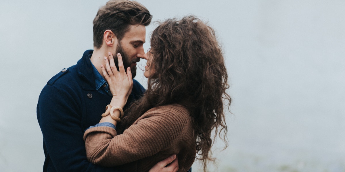 This Simple Test Will Reveal If Your Relationship Is Healthy — Or If It's Time To Break Up man and woman embracing