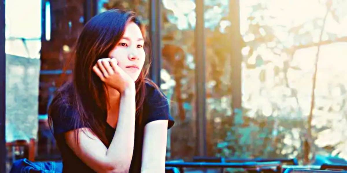 How To Turn Off Your Emotions When Someone Hurts You sad woman looking out the window
