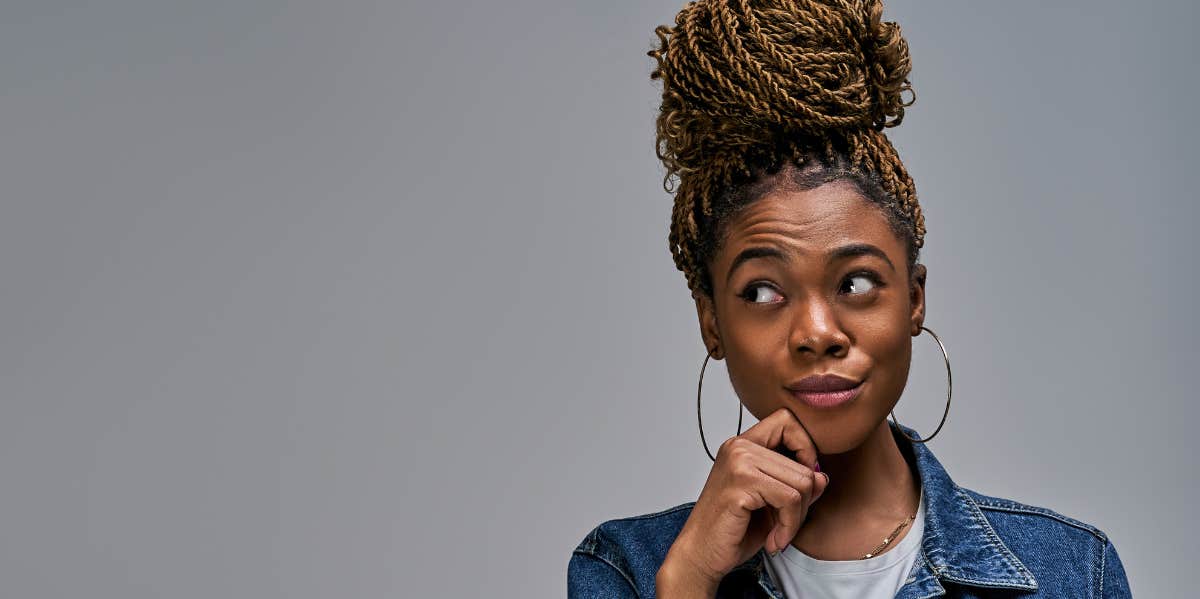 How To Use Positive Affirmations Effectively woman thinking of positive affirmations