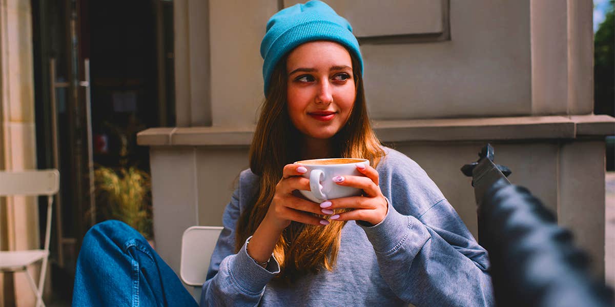 How You Drink Your Coffee Reveals Exactly Who You Are girl drinking coffee