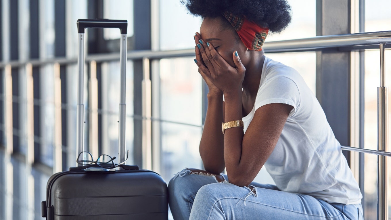 A woman is crying at the airport