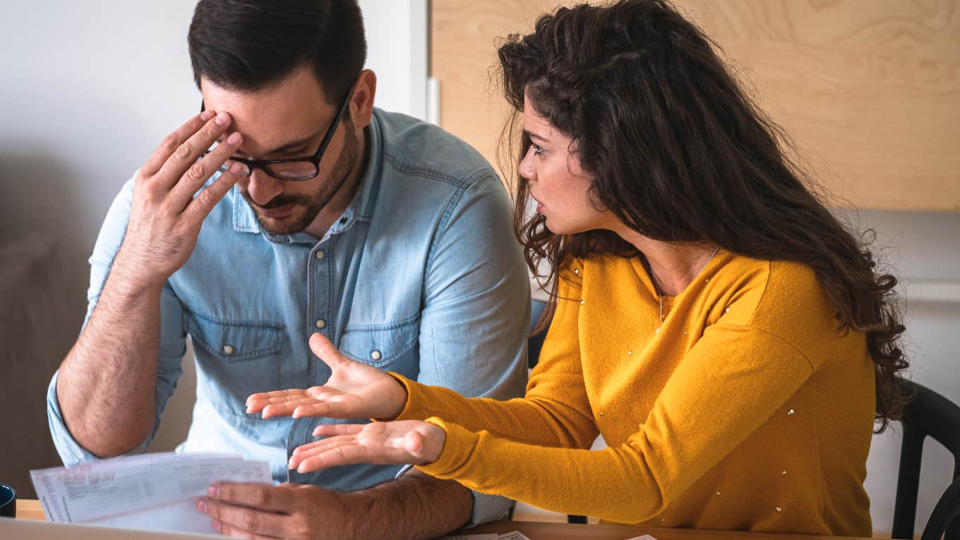 husband and wife heatedly discussing finances