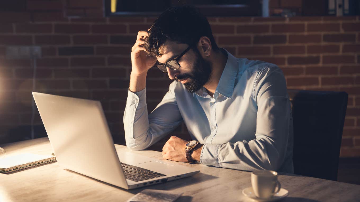 Husband Hacked Wife's LinkedIn Profile To Publicly Shame Her For Cheating sad man staring at computer