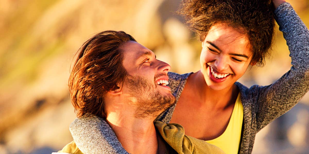 Husband knows about wife Happy man and woman together outside.