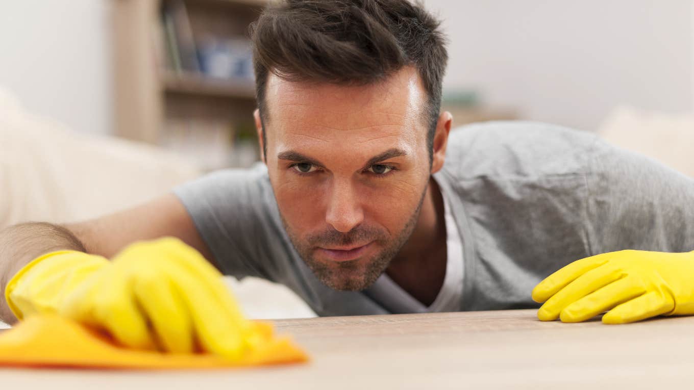 husband cleaning the house