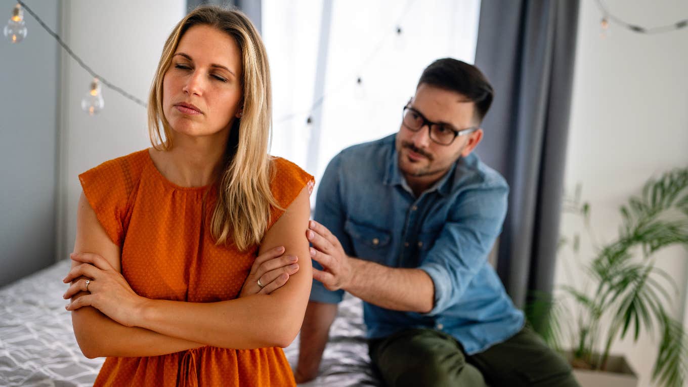 husband reaching for upset wife