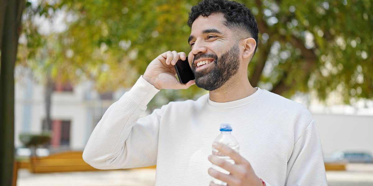 man drinking water