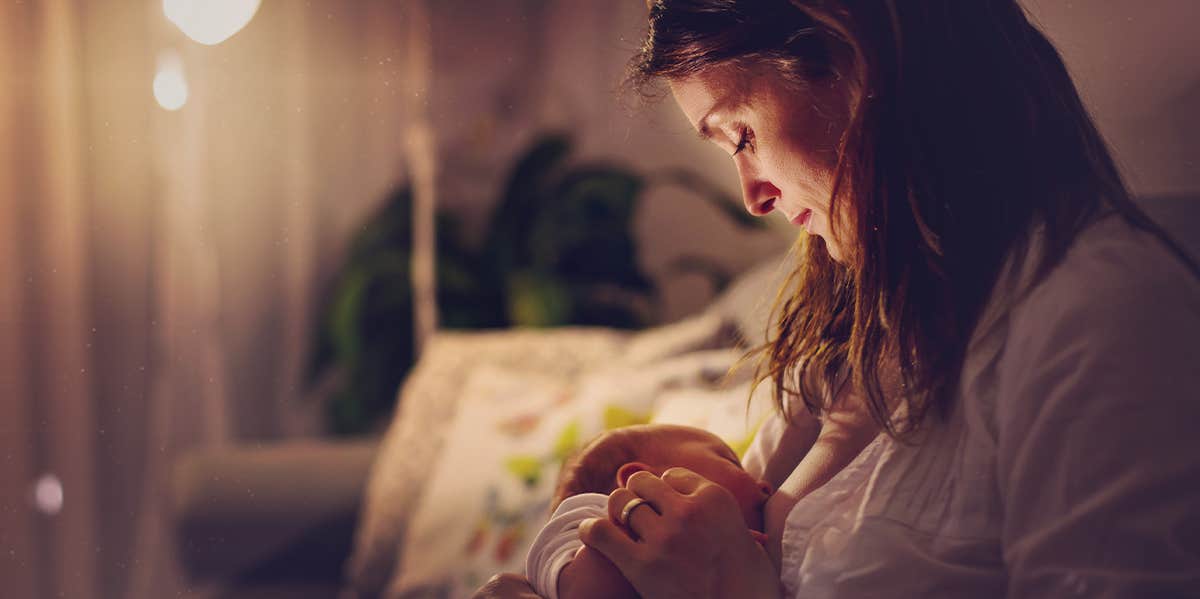 I Breastfed Another Woman's Baby — And Have Zero Regrets woman breastfeeding
