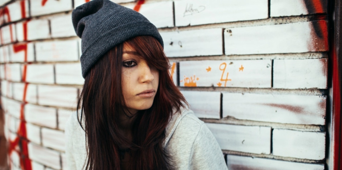 I Don't Want To Die, I Just Want To Be Free woman standing looking stressed