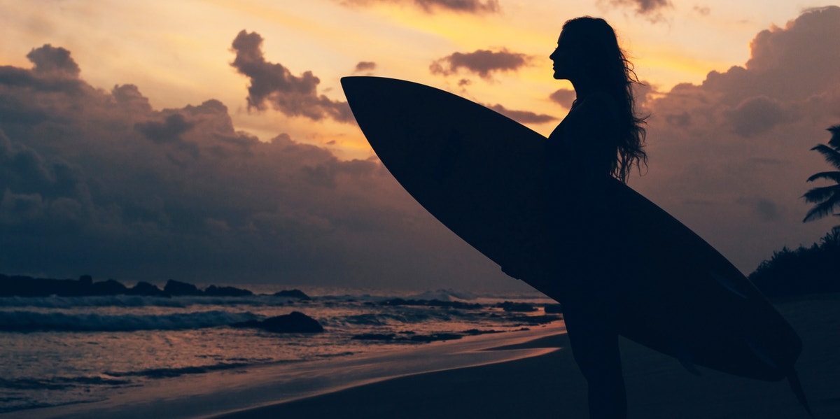 woman going surfing