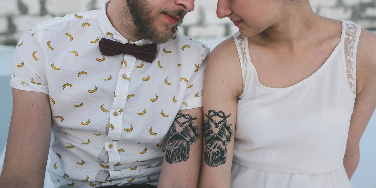 couple with matching tattoos