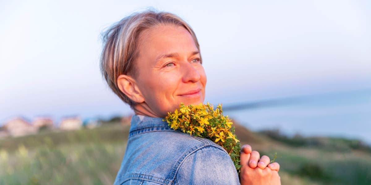 woman holding flowers