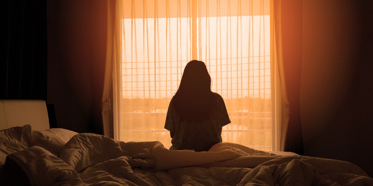 Things Changed After Saying 'I Love You' — It Destroyed Our Relationship sad woman at window back turned