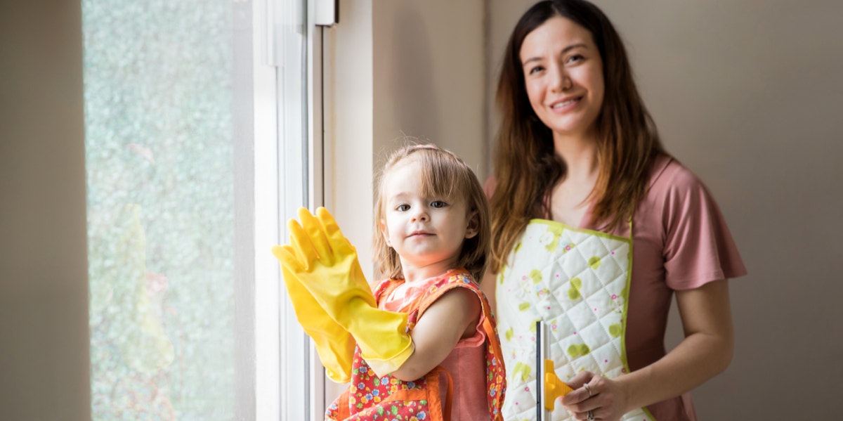 mom and toddler doing chores