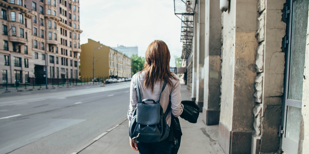 woman walking away