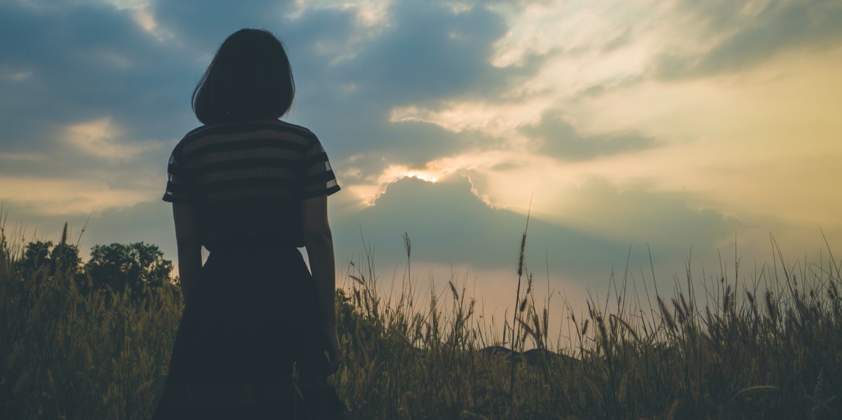 woman standing in field 