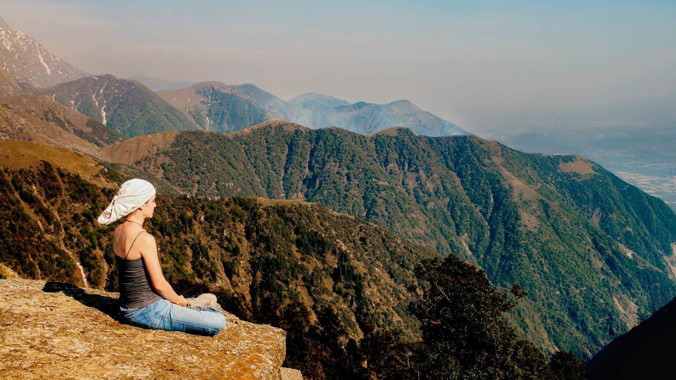 Author meditating on mountain side