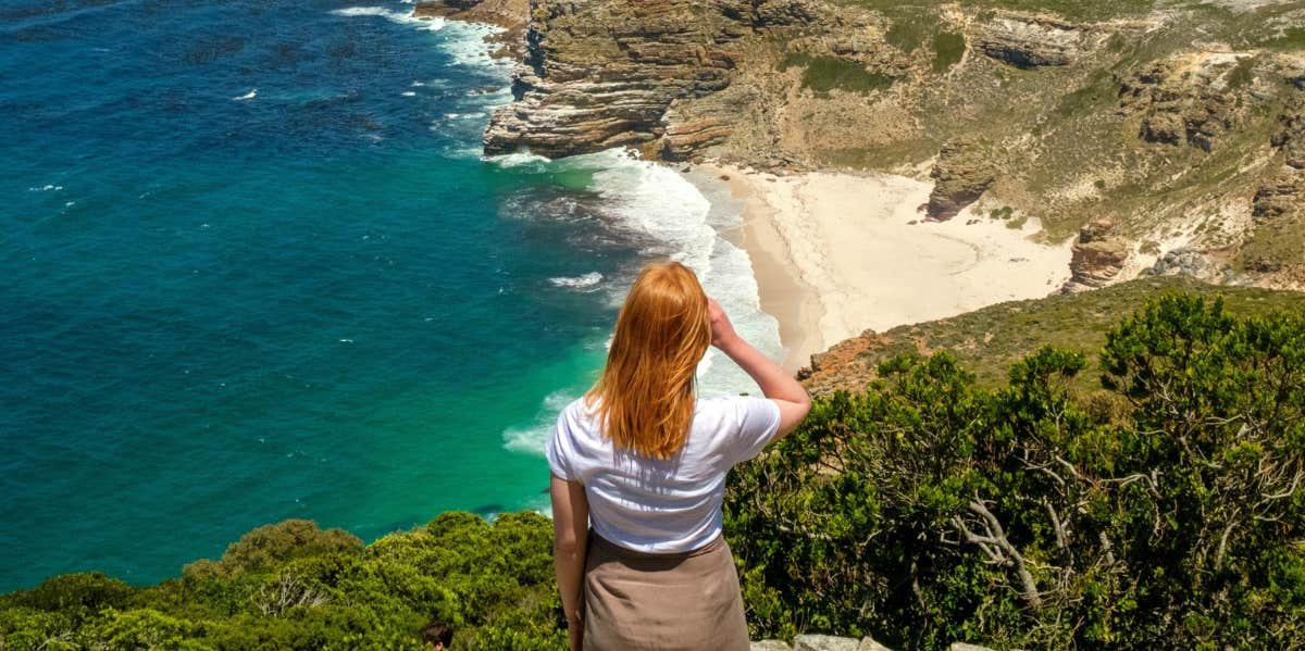 woman overlooking beach