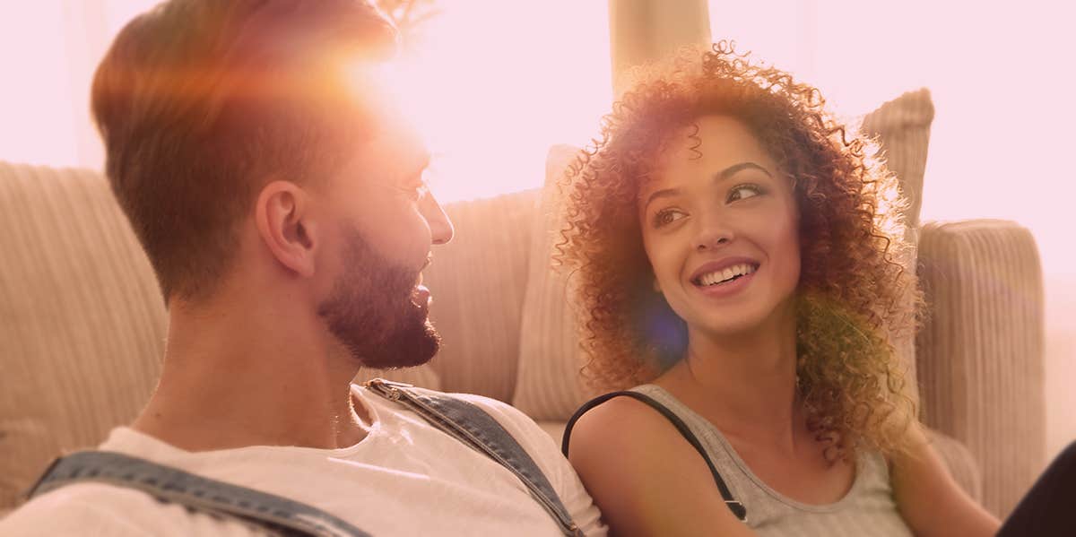 couple looking at each other, laughing