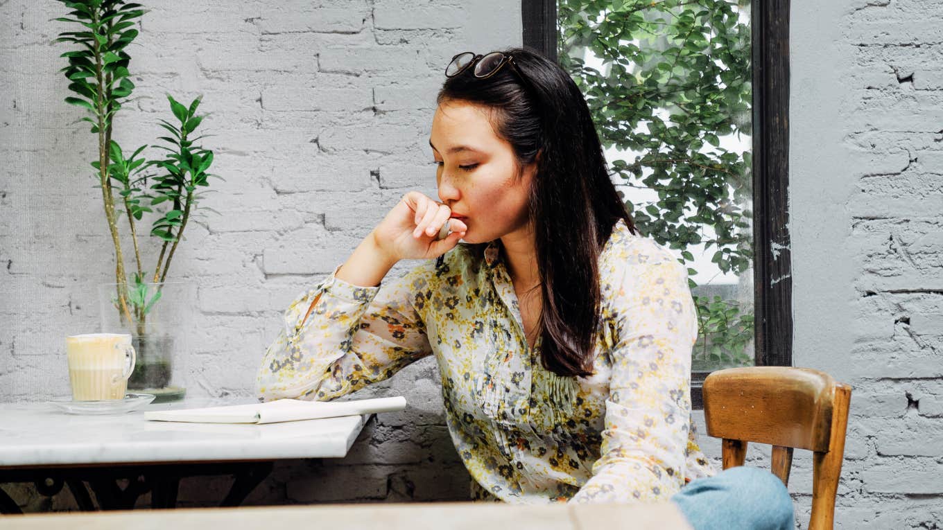 Woman listening intently to the voice inside her head 