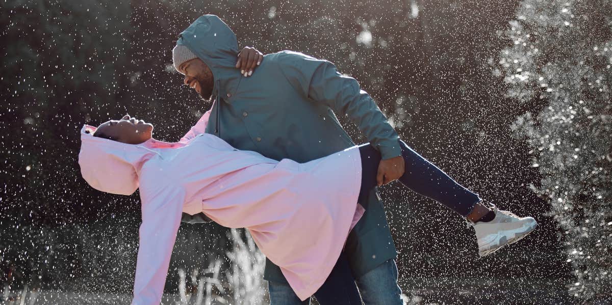 man and woman in snow