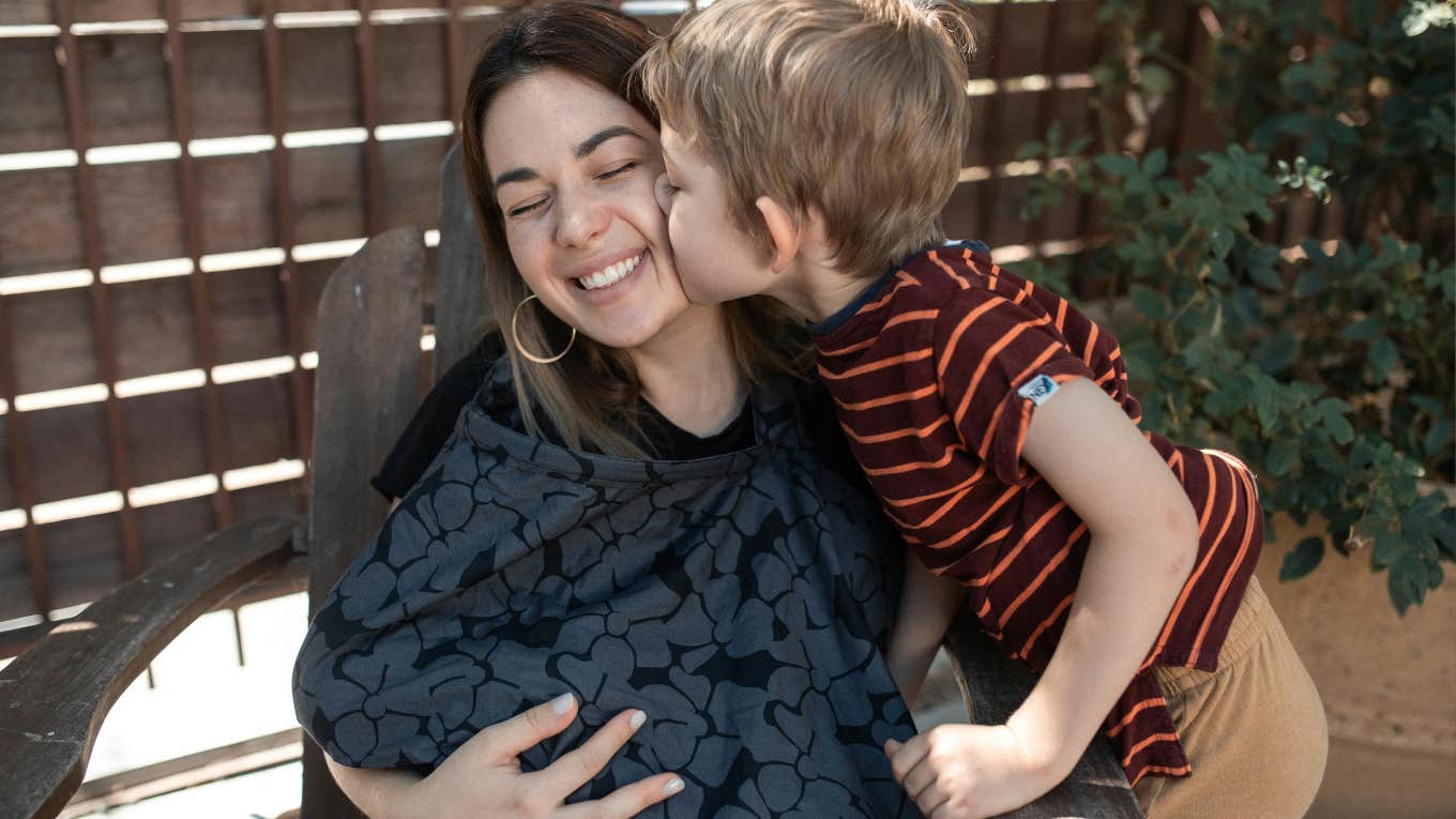 Son kissing mother on the cheek 