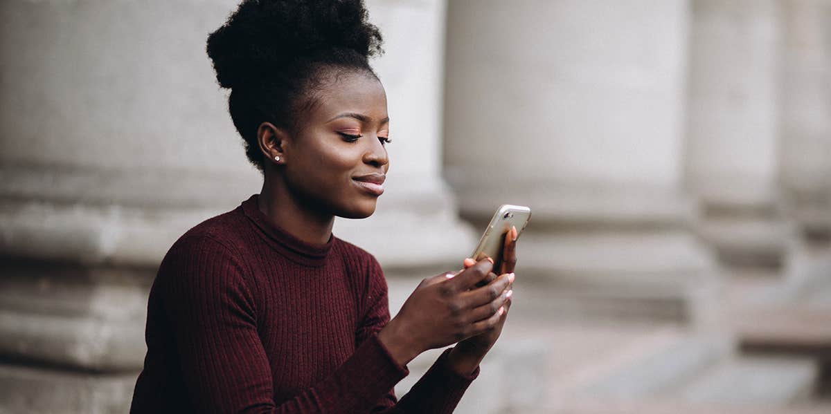 woman checking phone