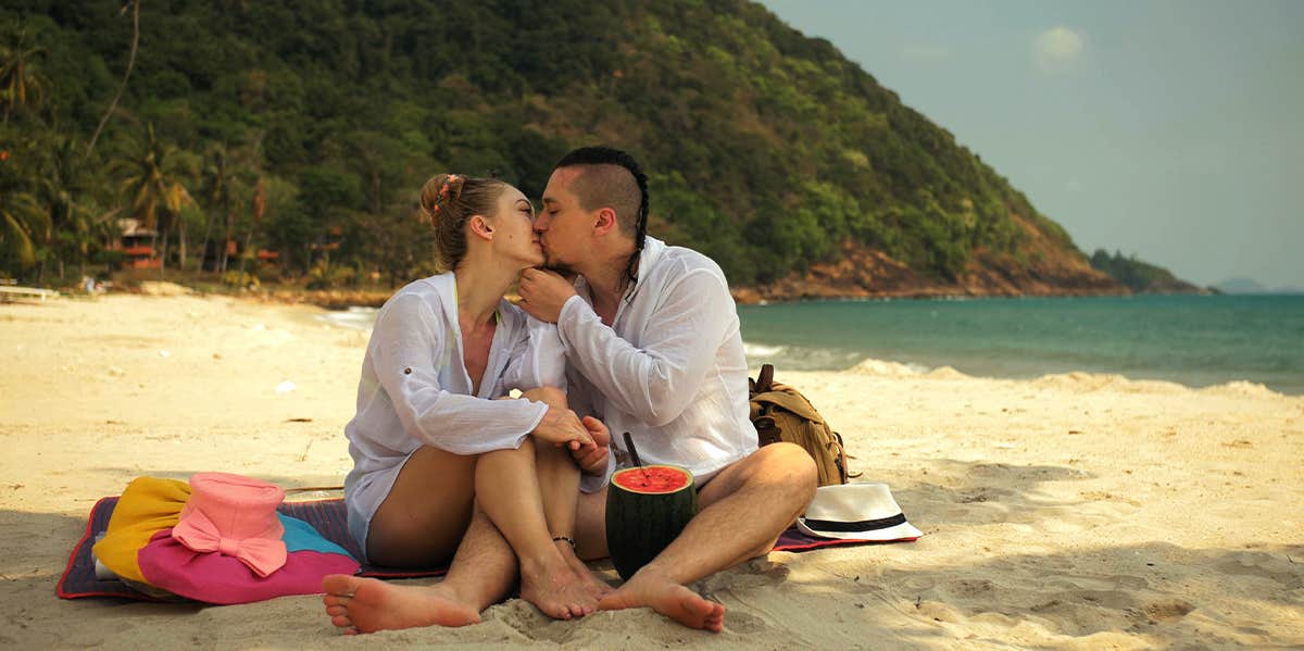 Couple sitting on beach