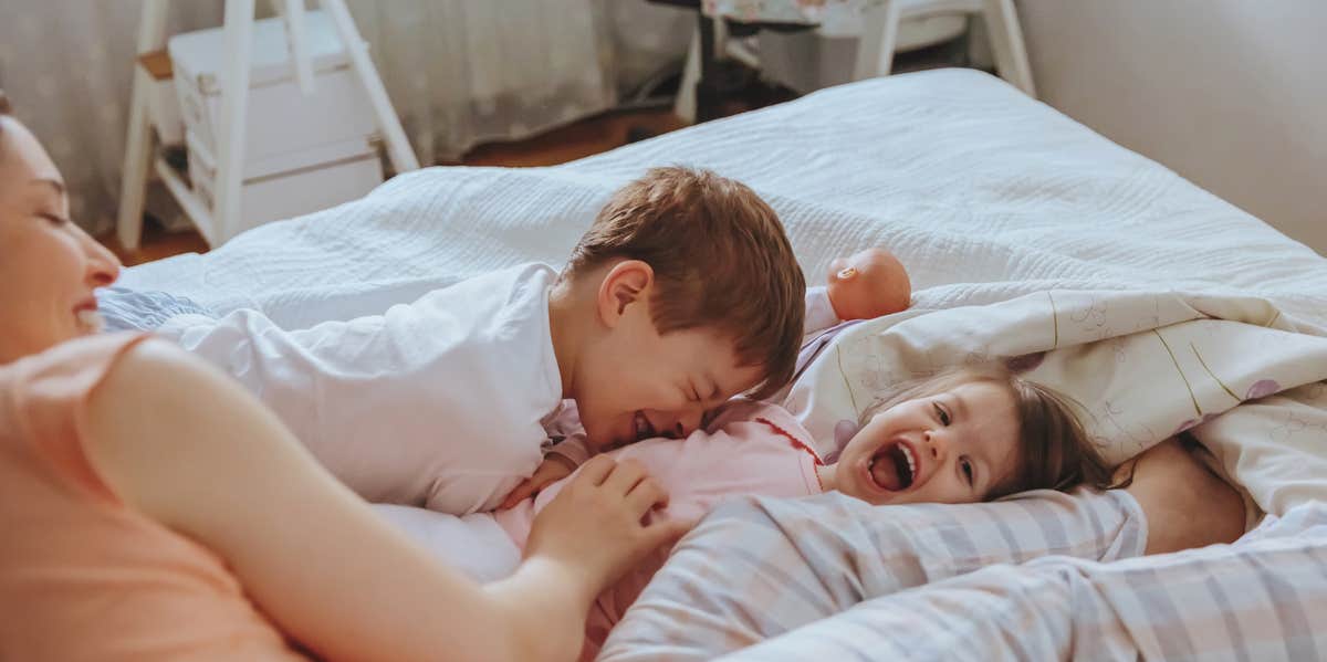 I'm A "Real" Mom Because I Mess Up, Not Because My House Is Messy mom playing with kids