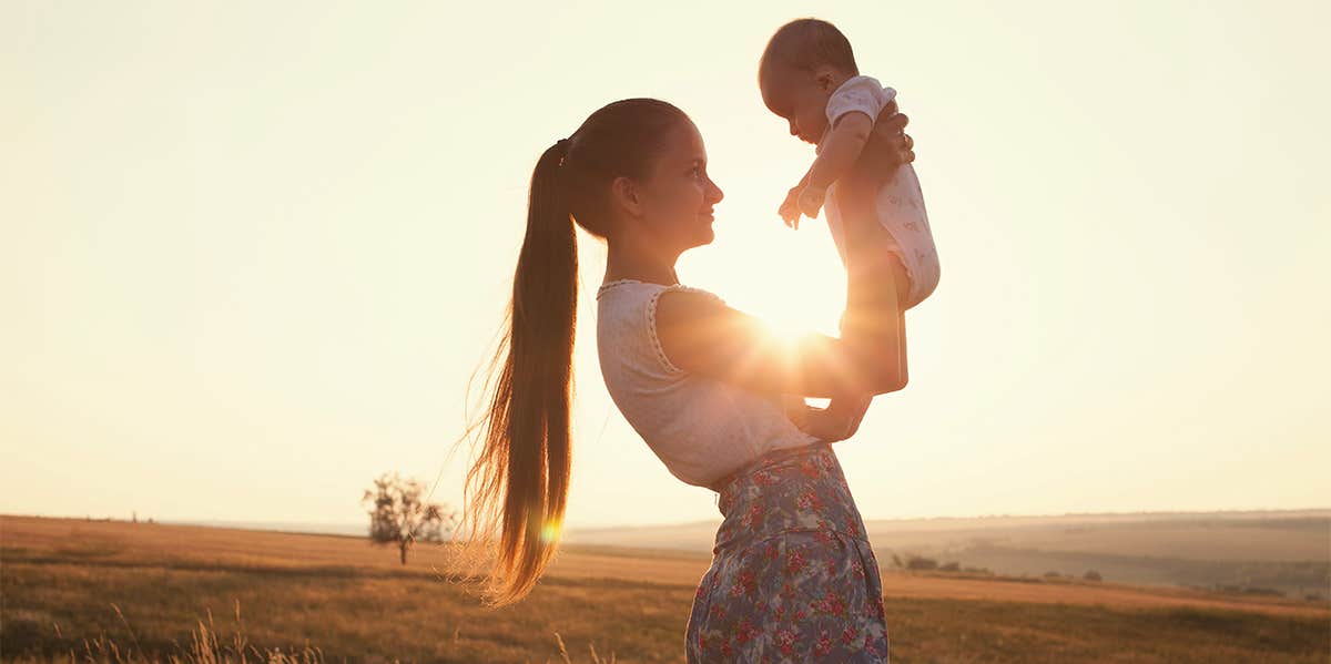 woman holding baby