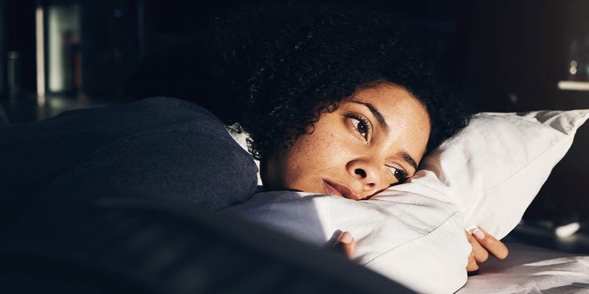 woman laying in bed