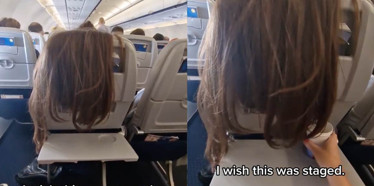 Woman drapes her hair over the back of an airplane seat