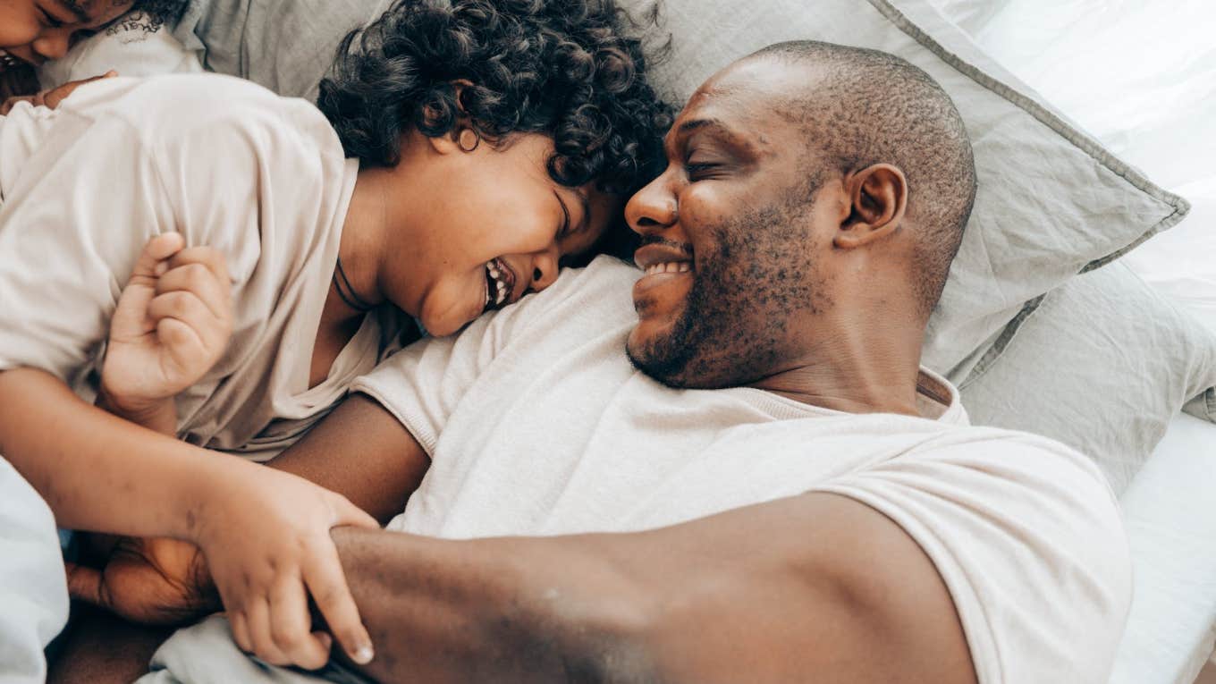 Dad inspiring child to be their silly self 