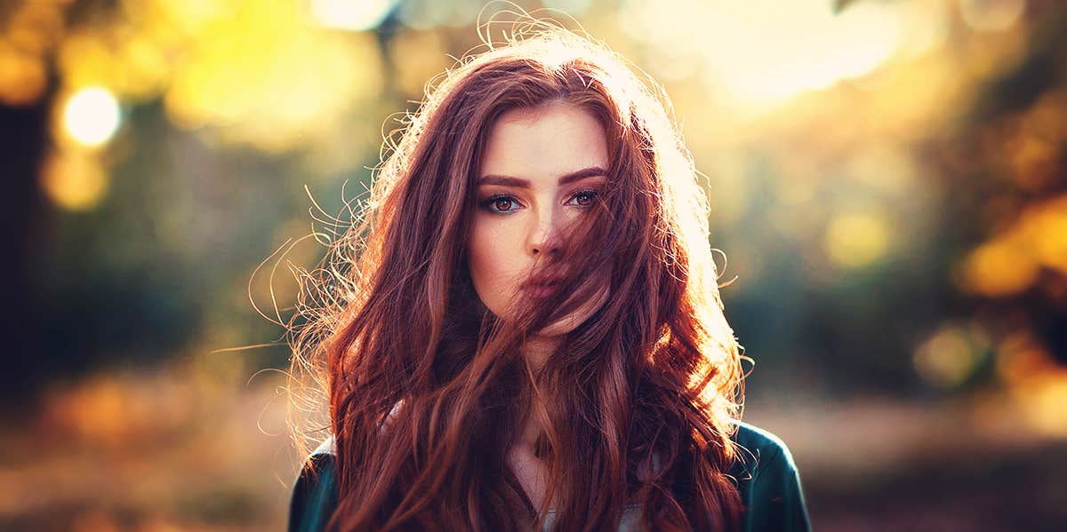 What Is Internalized Misogyny & How To Unlearn It sad woman looking forward