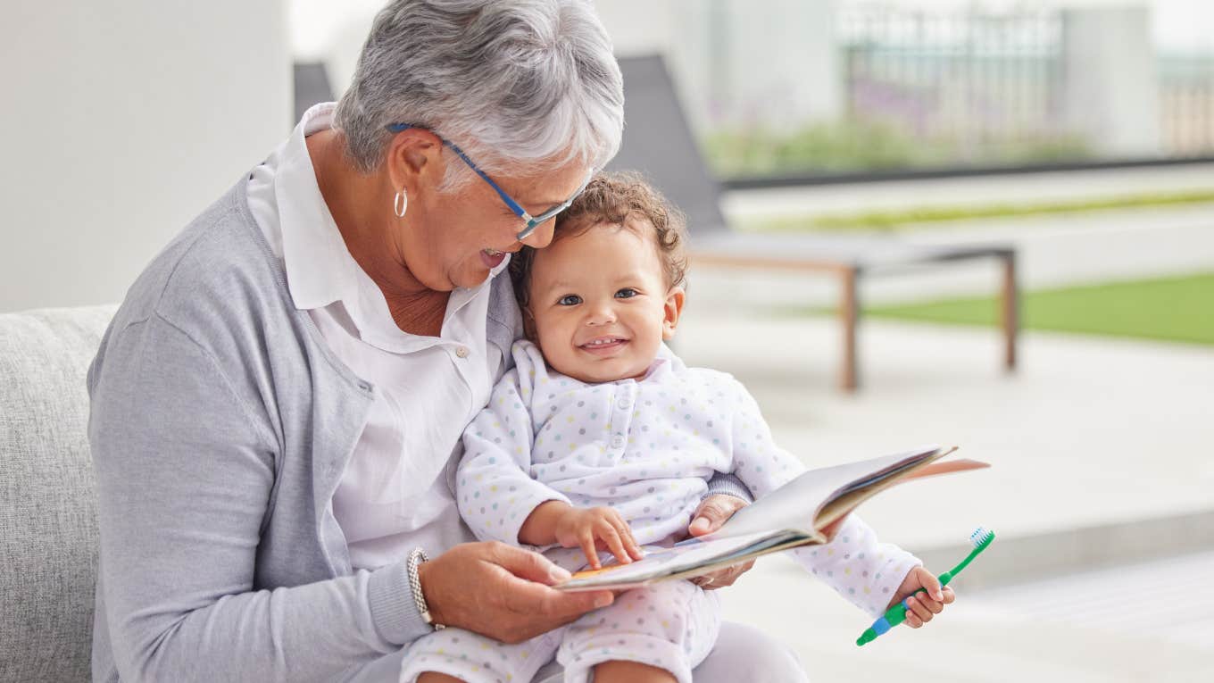 Retirement Home Has A Childcare Center Where Seniors Help Take Care of Little Kids retiree with a baby