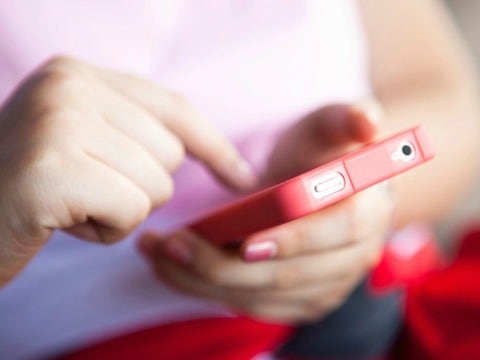 Hung Up On Your Ex? Download These 4 Apps woman on iphone