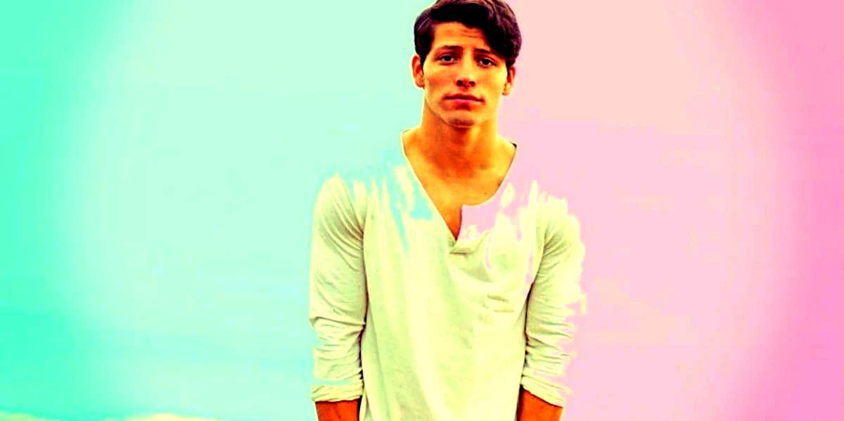 Is He Emotionally Unavailable Or Not Into You? emotionally unavailable man in front of multi-colored background