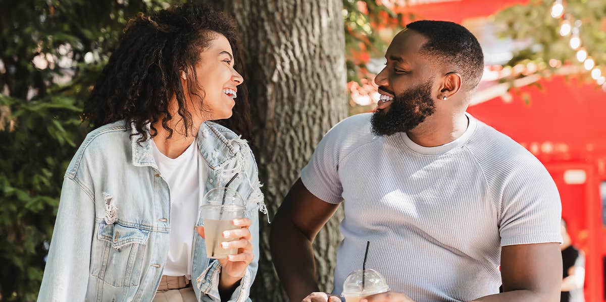 man and woman talking