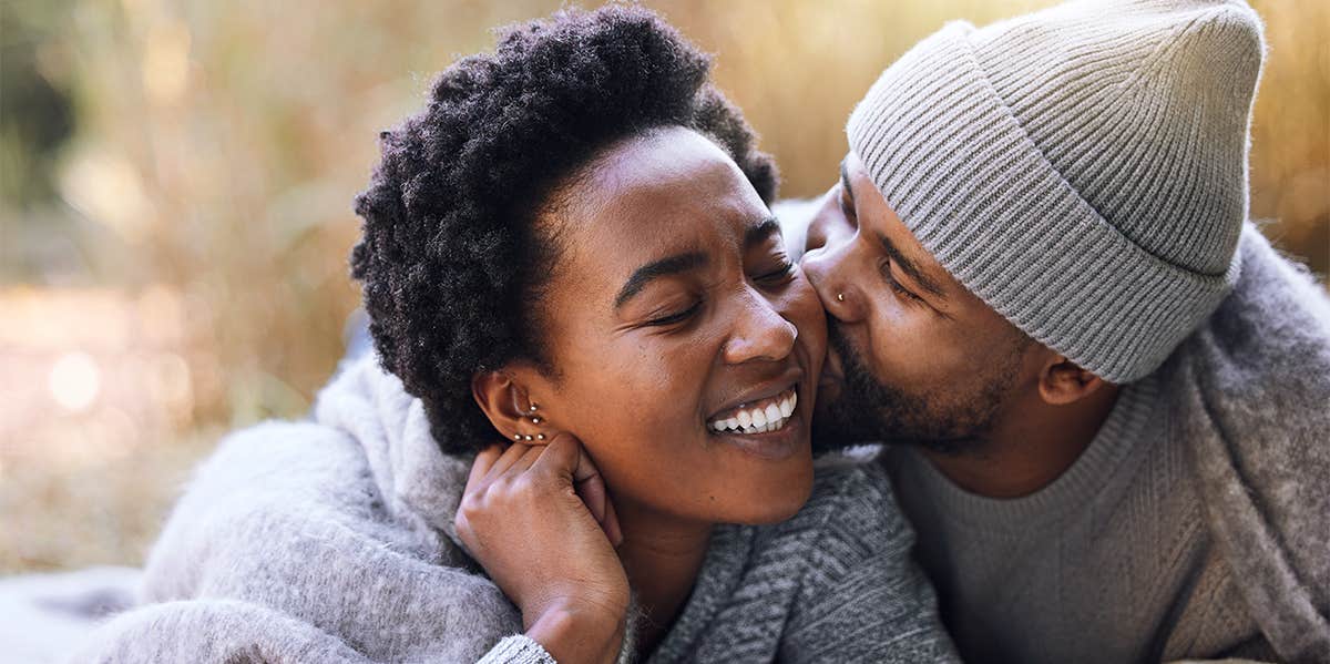 4 Little Signs That Confirm You've Found 'The One' man kissing woman's cheek
